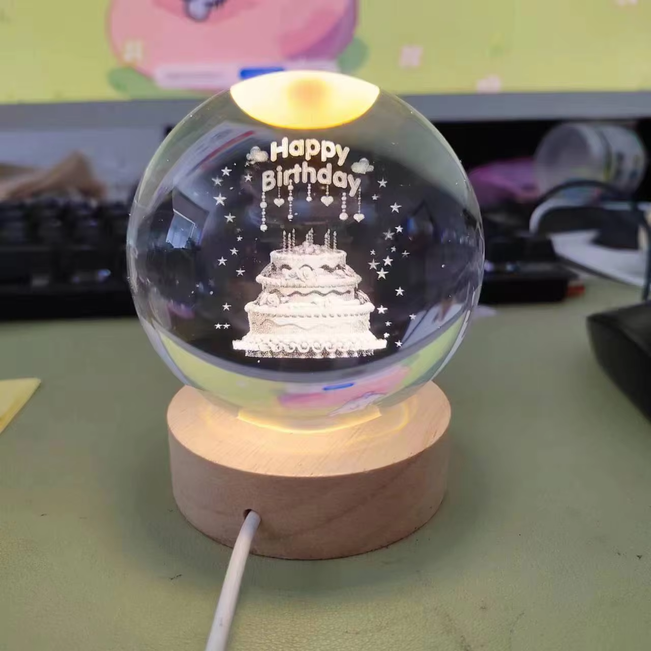 Light crystal ball with 3D Birthday cake. Includes a light base and a remote control