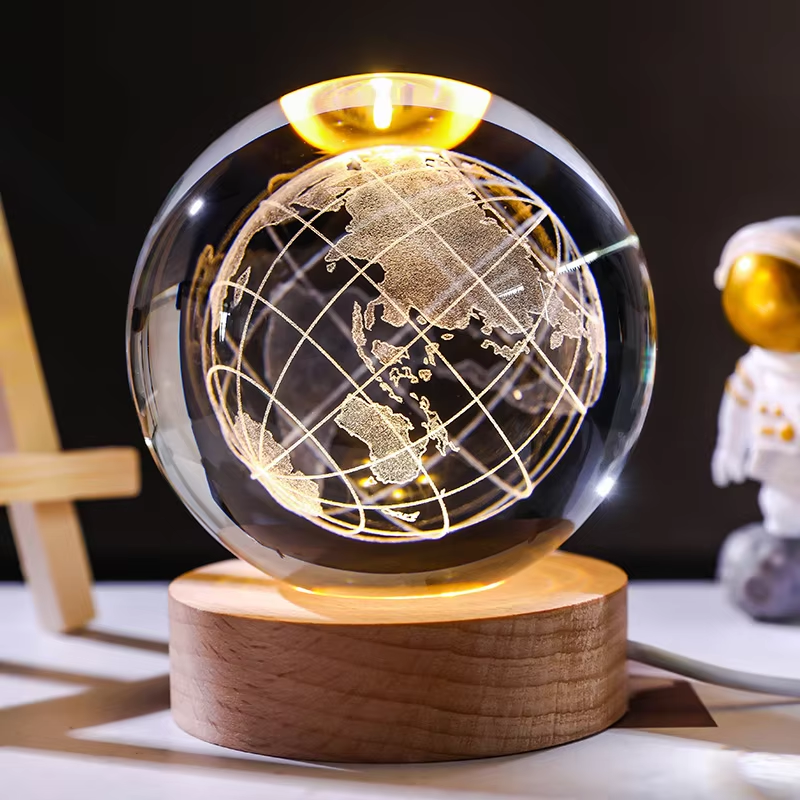 Light crystal ball with 3D Earth picture. Includes a light base and a remote control